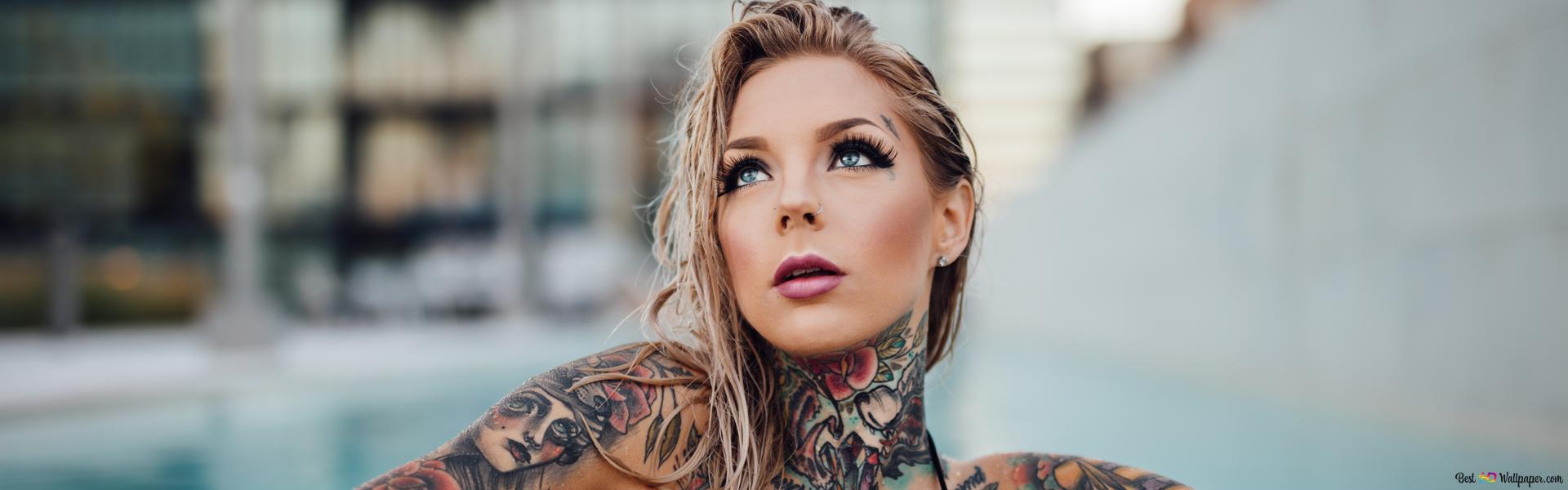 sexy-blonde-girl-with-tattoos-swimming-in-the-pool-wallpaper-1920x600_57